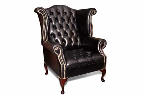 Blenheim Scroll Wing Chair in OE Black with Brass Studs
